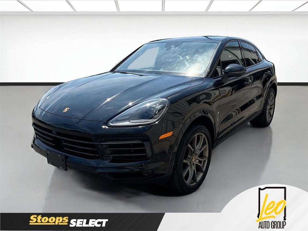 2023 Porsche Cayenne Coupe Platinum Edition in Black — front three-quarter view