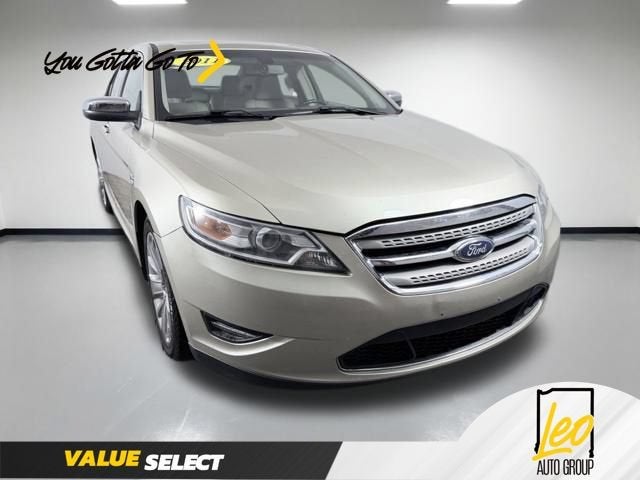 2011 Ford Taurus Limited in Gold — front three-quarter view