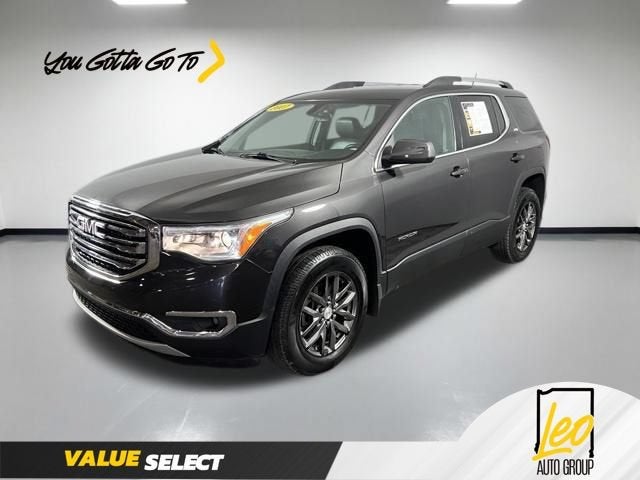 2017 GMC Acadia SLT in Iridium Metallic — front three-quarter view