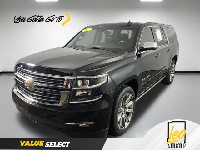 2017 Chevrolet Suburban Premier in Black — front three-quarter view