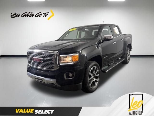 2019 GMC Canyon 4WD Denali in Onyx Black — front three-quarter view