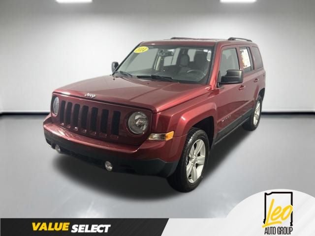 2014 Jeep Patriot Sport in Deep Cherry Red Crystal Pearlcoat — front three-quarter view