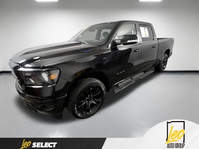 2022 RAM 1500 Big Horn Crew Cab 4x4 6'4' Box in Diamond Black Crystal Pearlcoat — front three-quarter view