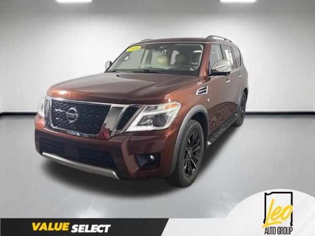 2018 Nissan Armada Platinum in Forged Copper — front three-quarter view