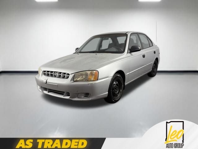 2001 Hyundai Accent GL in Silver Mist — front three-quarter view