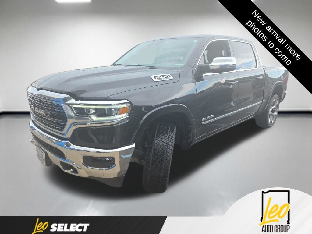 2024 RAM 1500 Limited in Diamond Black Crystal Pearlcoat — front three-quarter view