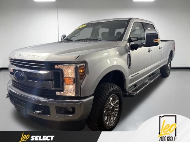 2018 Ford F-350SD XLT in Ingot Silver — front three-quarter view