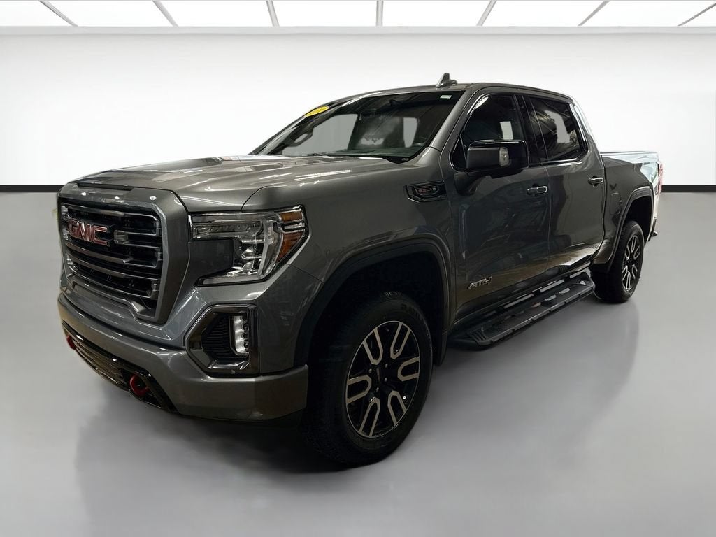 2021 GMC Sierra 1500 AT4 in Satin Steel Metallic — front three-quarter view