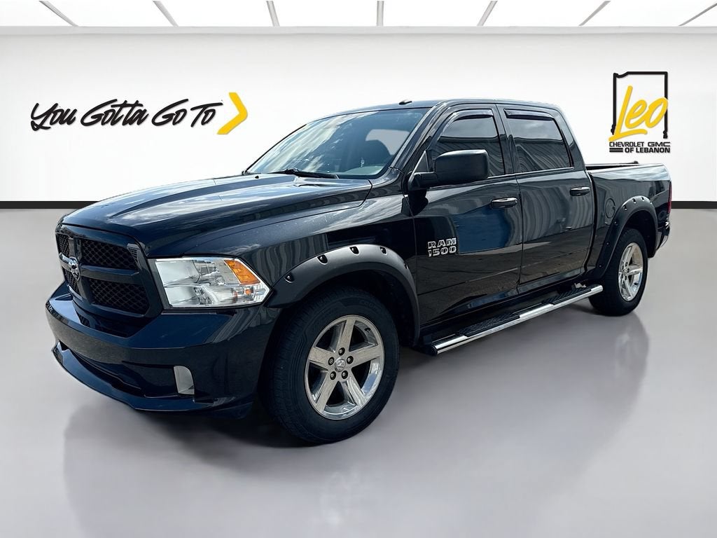 2016 RAM 1500 Express in Black — front three-quarter view