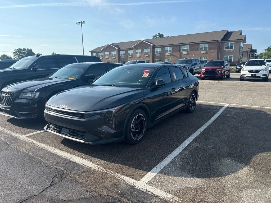 2025 Kia K4 EX in Gray — front three-quarter view