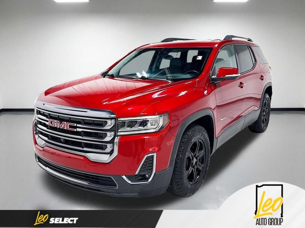 2021 GMC Acadia AT4 in Cayenne Red Tintcoat — front three-quarter view