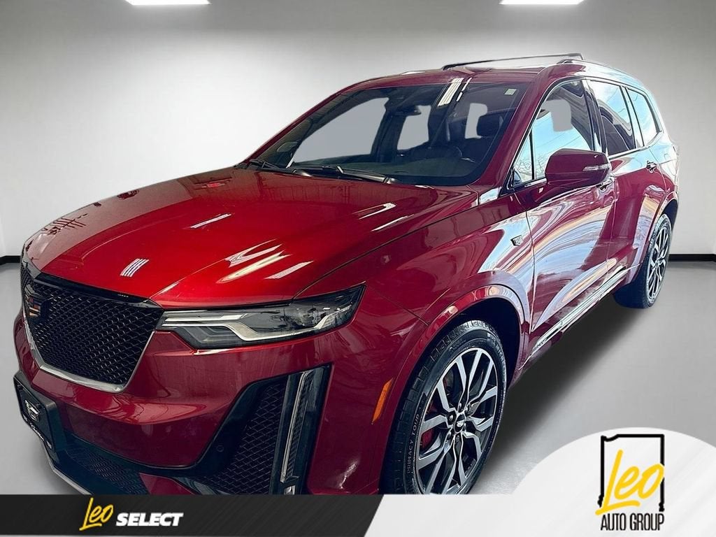 2023 Cadillac XT6 Sport in Radiant Red Tintcoat — front three-quarter view