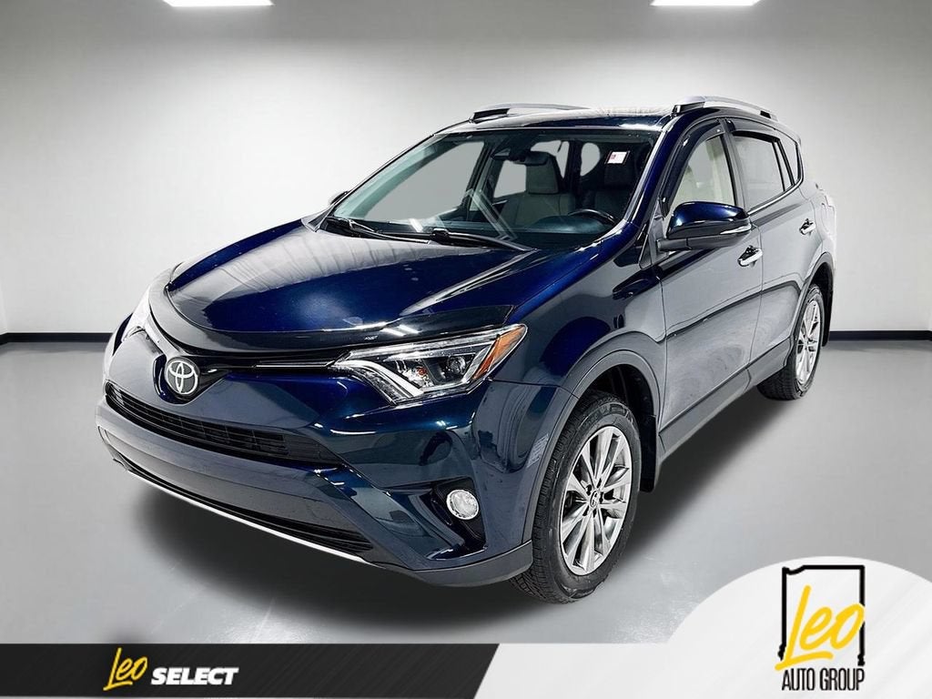 2018 Toyota RAV4 Limited in Blue — front three-quarter view